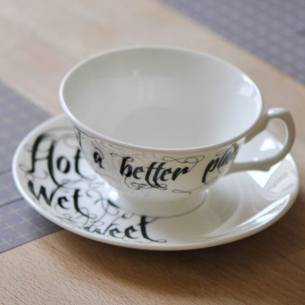 Black and White Teacup and Saucer Set